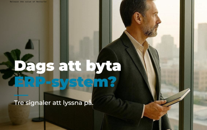 Senior ledare vid panoramafönster med stadsutsikt — reflekterar över beslut om att byta ERP-system. Noresca, NetSuite-partner.